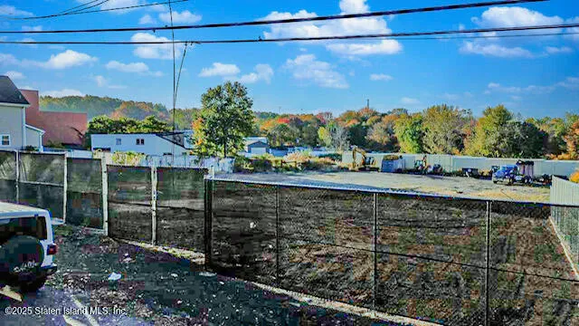 a view of a pathway with a glass door