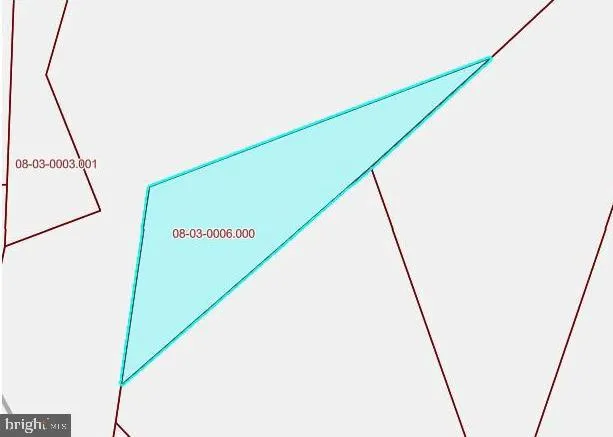 a view of a hallway with stairs