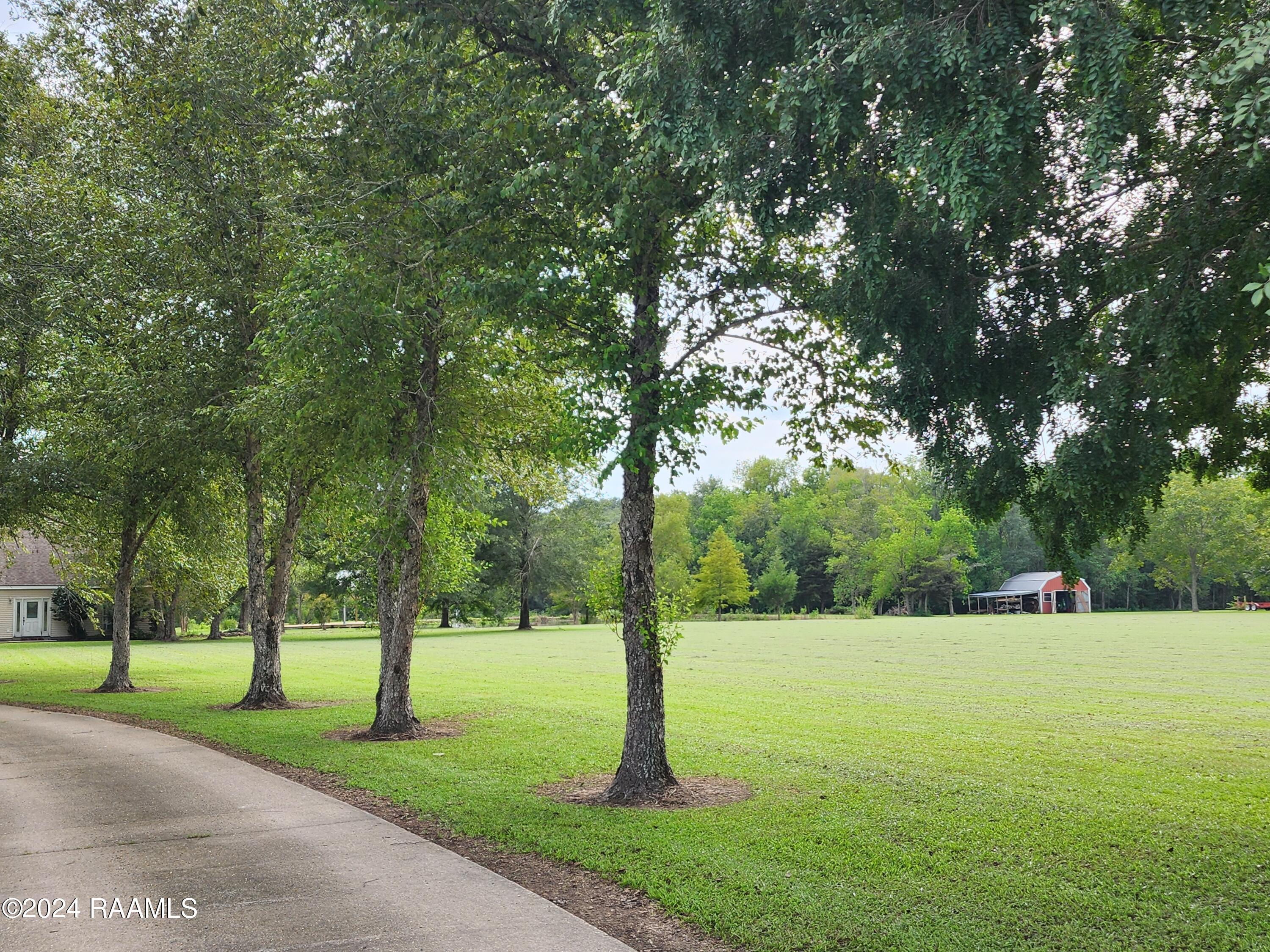 1078 Curleys Road Sunset, LA 70584 - Photo 40 of 42 side yard