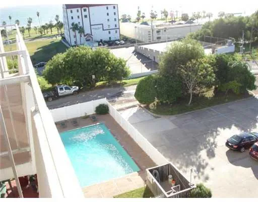a view of a yard with an outdoor seating