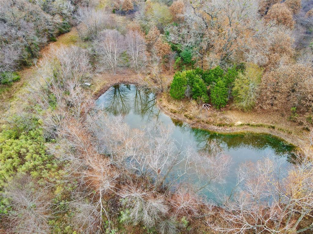 2425 County Road 2425 Como, TX 75431 - Photo 3 of 13 Drone / aerial view with a water view