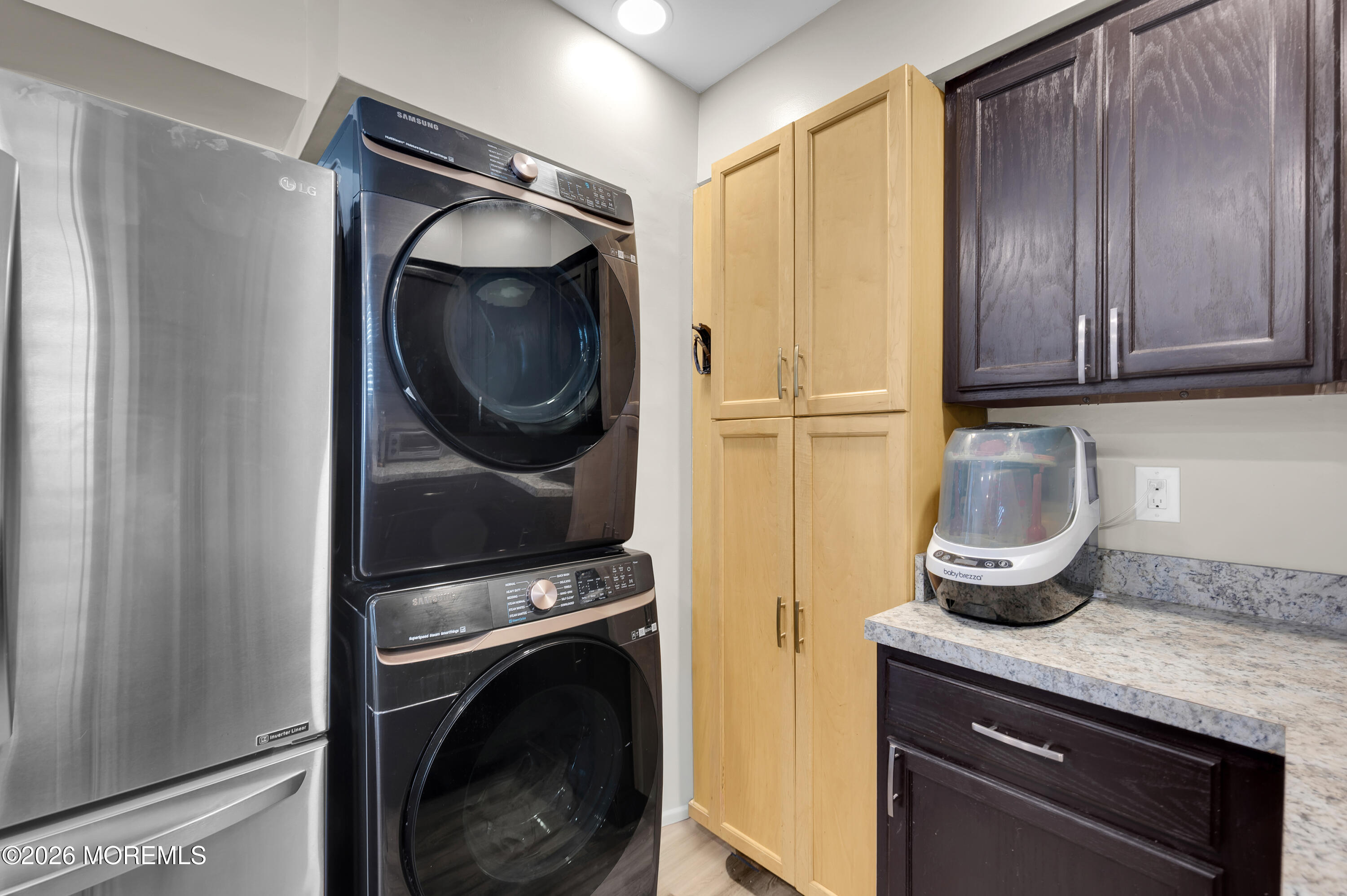 932 Harrison Road Toms River, NJ 08753 - Photo 17 of 30 a kitchen with a refrigerator and cabinets