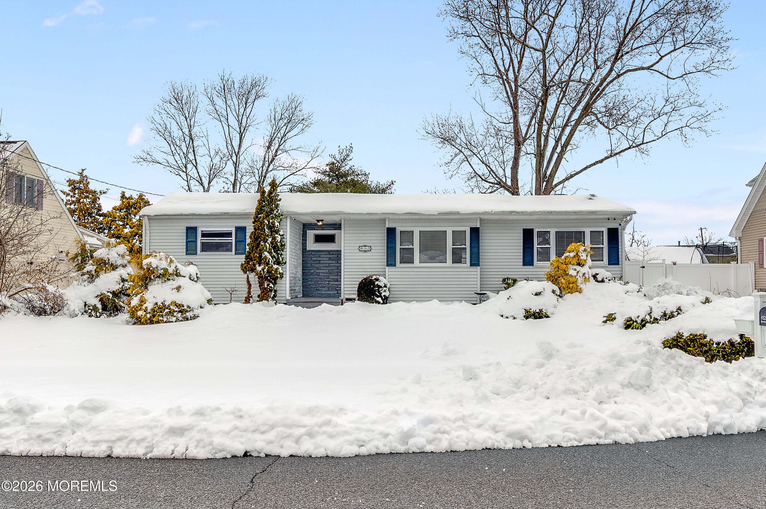 932 Harrison Road Toms River, NJ 08753 - Photo 23 of 30 a view of a house with a yard covered in snow
