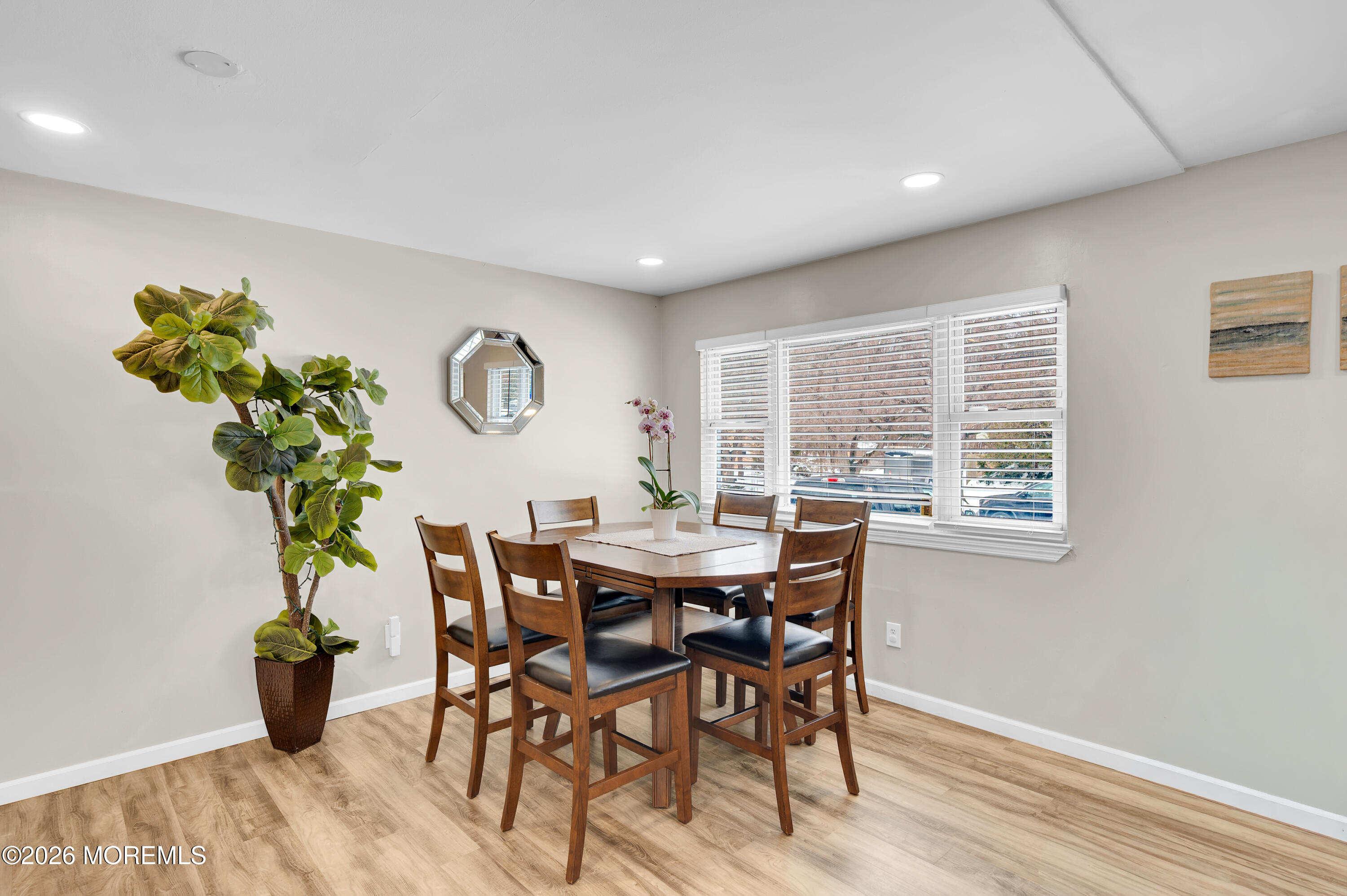932 Harrison Road Toms River, NJ 08753 - Photo 25 of 30 a view of a dining room with furniture window and wooden floor