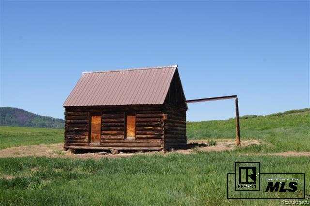 46450 Rcr 46 Steamboat Springs, Unit LONESOME EAGLE RANCH Steamboat Springs, CO 80487 - Photo 15 of 17 a view of a back yard of the house