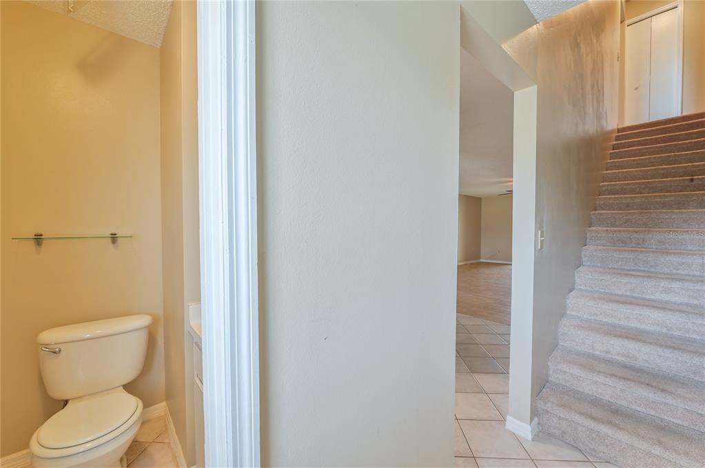 11001 Southeast Sunset Harbor Road, Unit H52 Summerfield, FL 34491 - Photo 26 of 31 a bathroom with a toilet