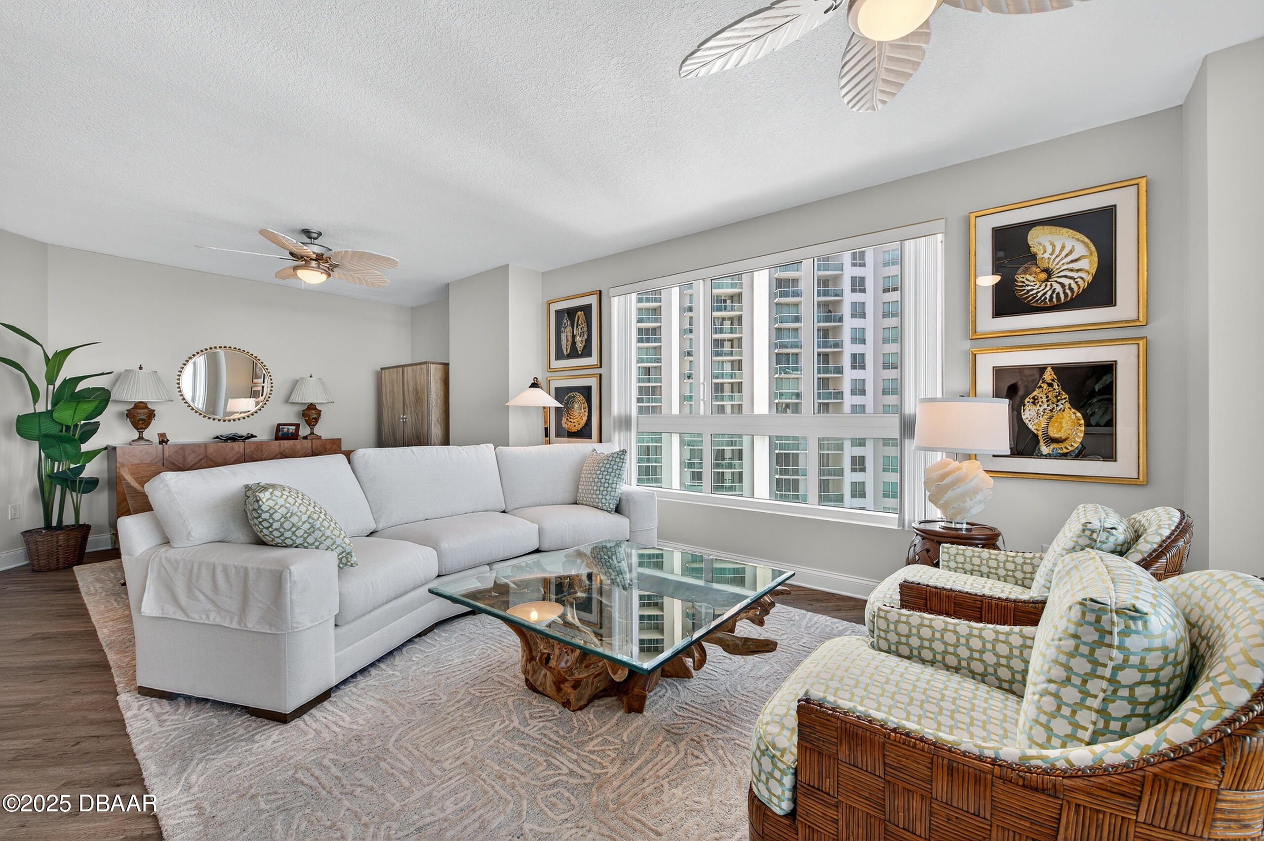 231 Riverside Drive, Unit 1602 Holly Hill, FL 32117 - Photo 14 of 45 a living room with furniture and a large window