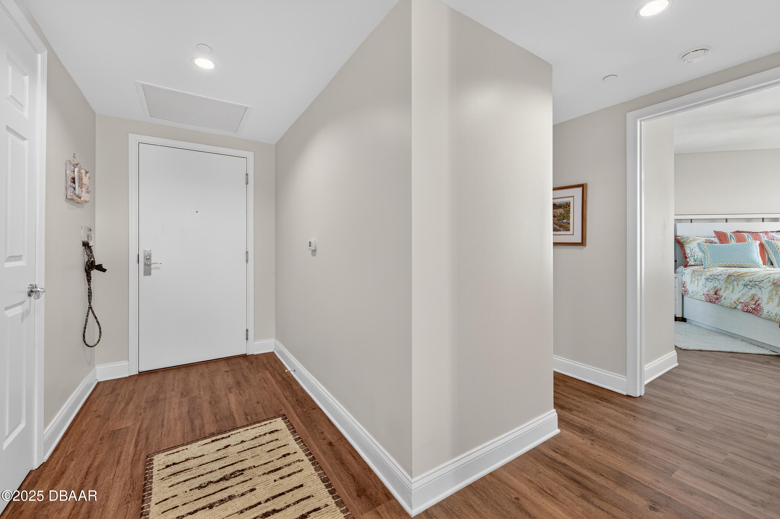 231 Riverside Drive, Unit 1602 Holly Hill, FL 32117 - Photo 18 of 45 a view of room with hardwood floor