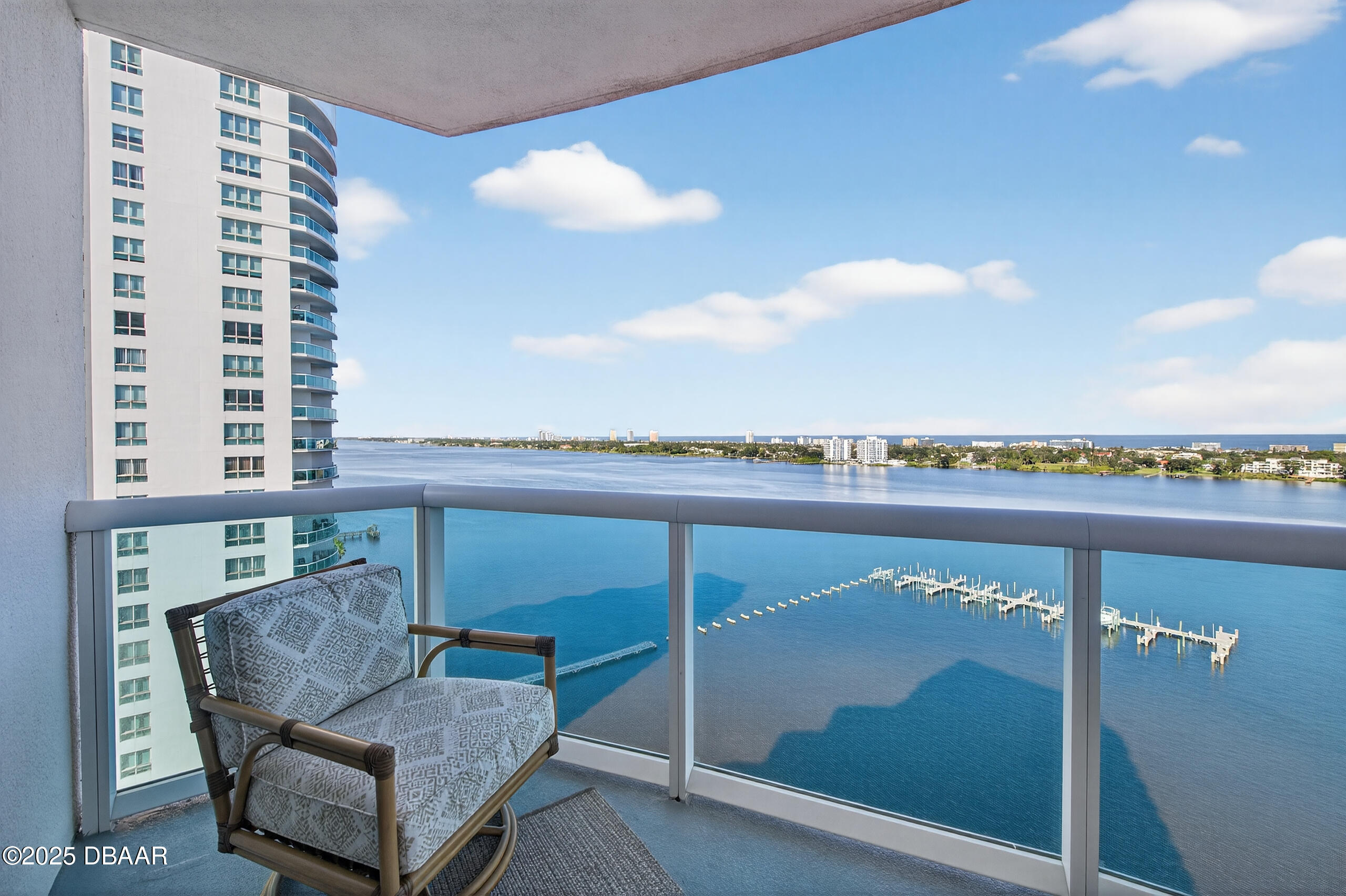 231 Riverside Drive, Unit 1602 Holly Hill, FL 32117 - Photo 32 of 45 a room with furniture and a potted plant