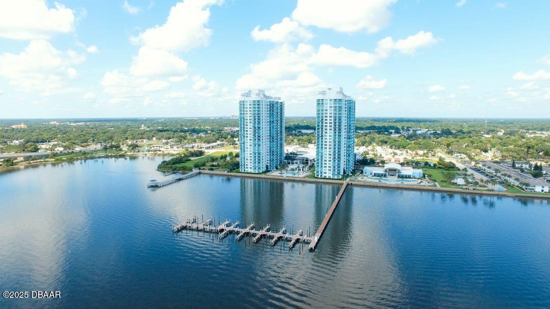 231 Riverside Drive, Unit 1602 Holly Hill, FL 32117 - Photo 34 of 45 a view of a lake with a city view