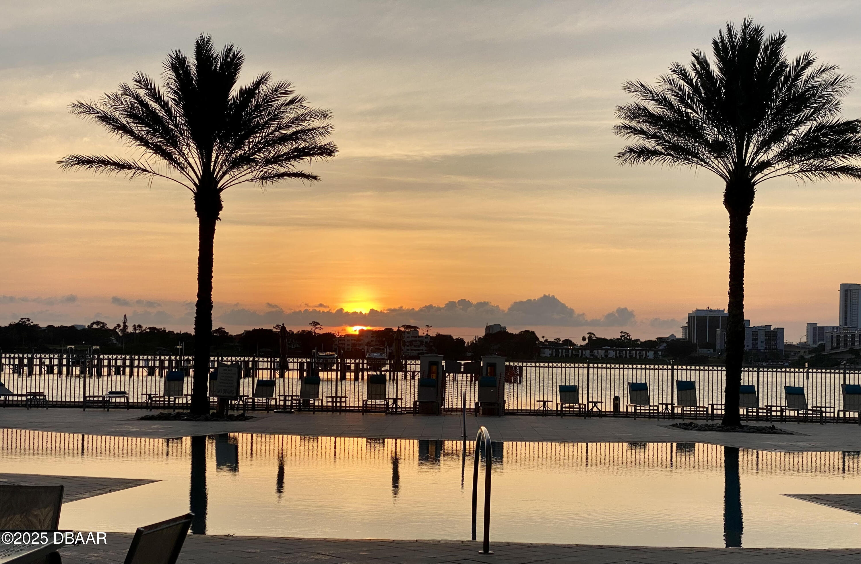 231 Riverside Drive, Unit 1602 Holly Hill, FL 32117 - Photo 40 of 45 Night view of infinity pool