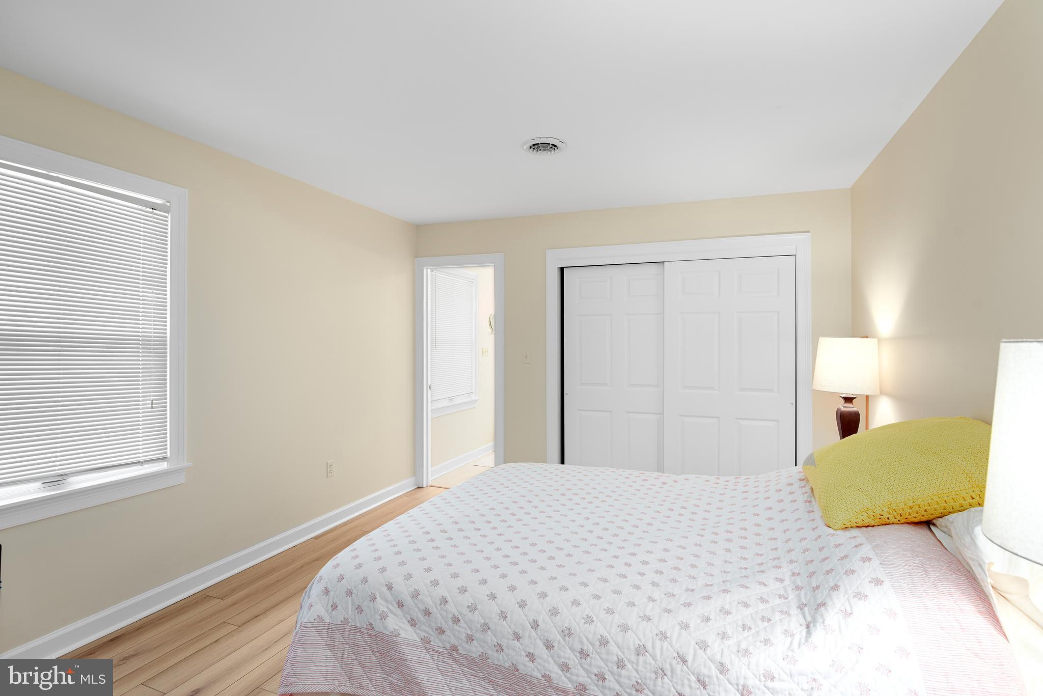 6379 Cedar Cove Road Royal Oak, MD 21662 - Photo 14 of 32 a bedroom with a bed and a window