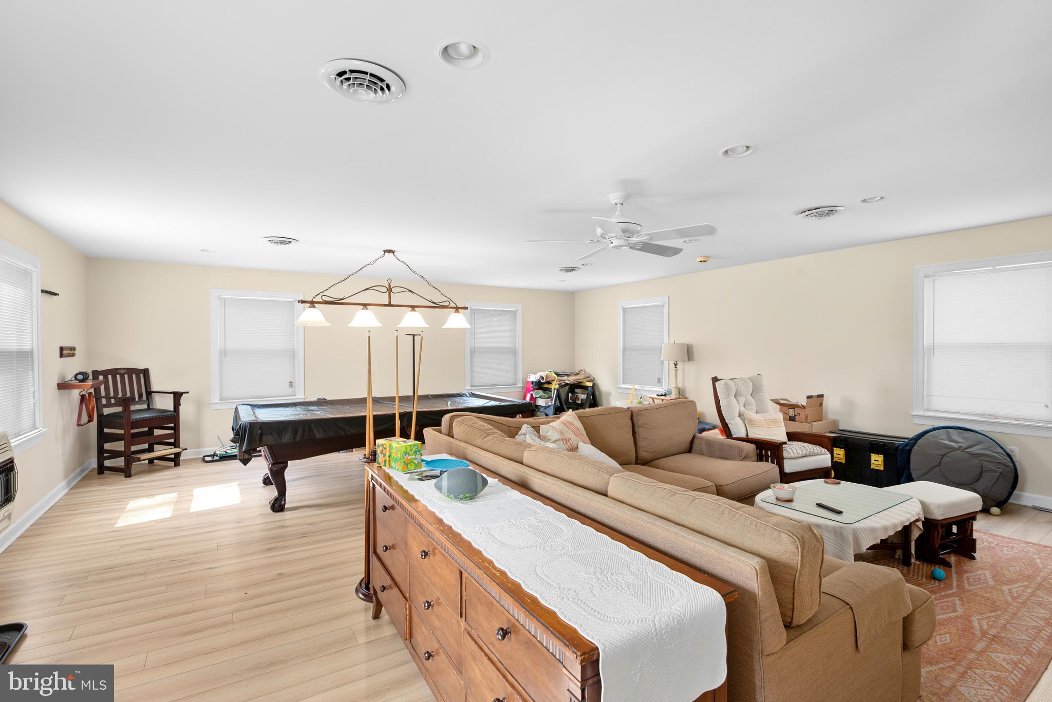 6379 Cedar Cove Road Royal Oak, MD 21662 - Photo 22 of 32 a living room with furniture and wooden floor