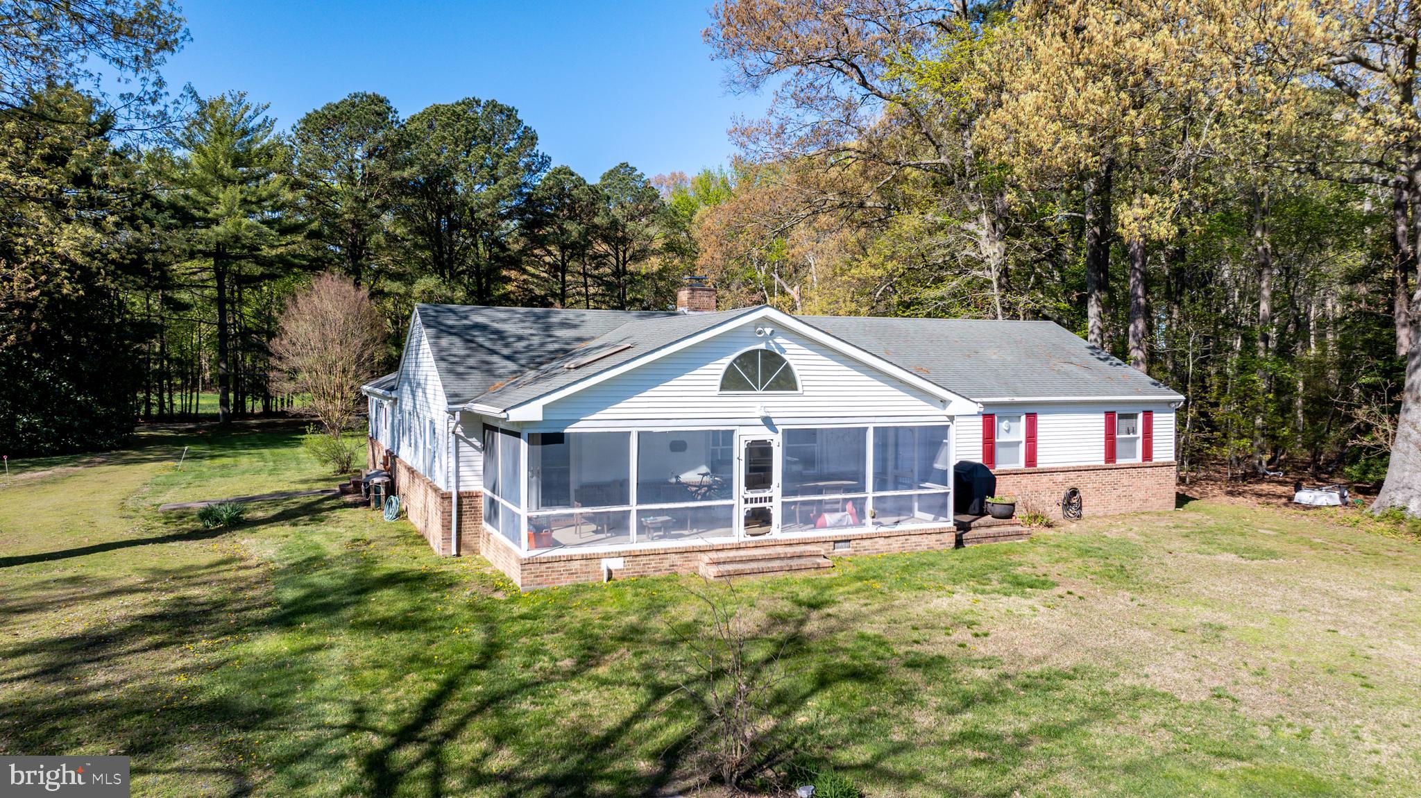 6379 Cedar Cove Road Royal Oak, MD 21662 - Photo 26 of 32 front view of a house with a yard