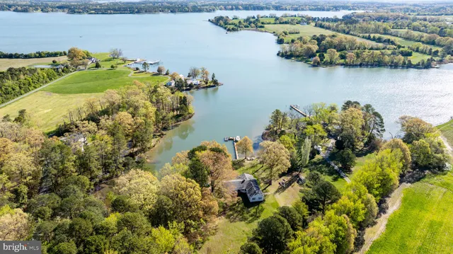 view of a lake with houses