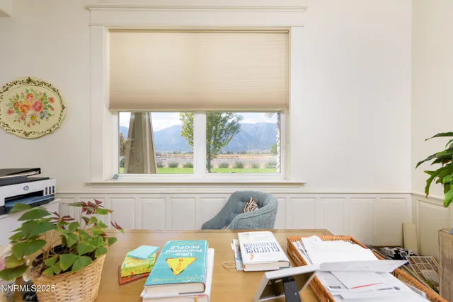 a bed room with a bed and a window