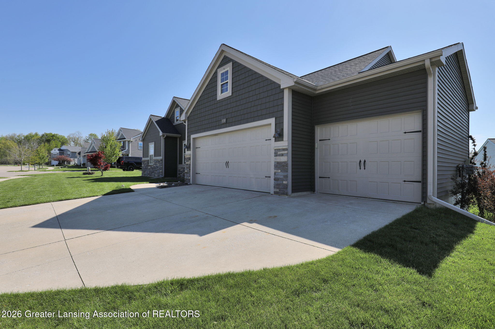 1138 Matthaei Court Mason, MI 48854 - Photo 3 of 33 9-web-or-mls-Photo May 08 2026, 10 22 55