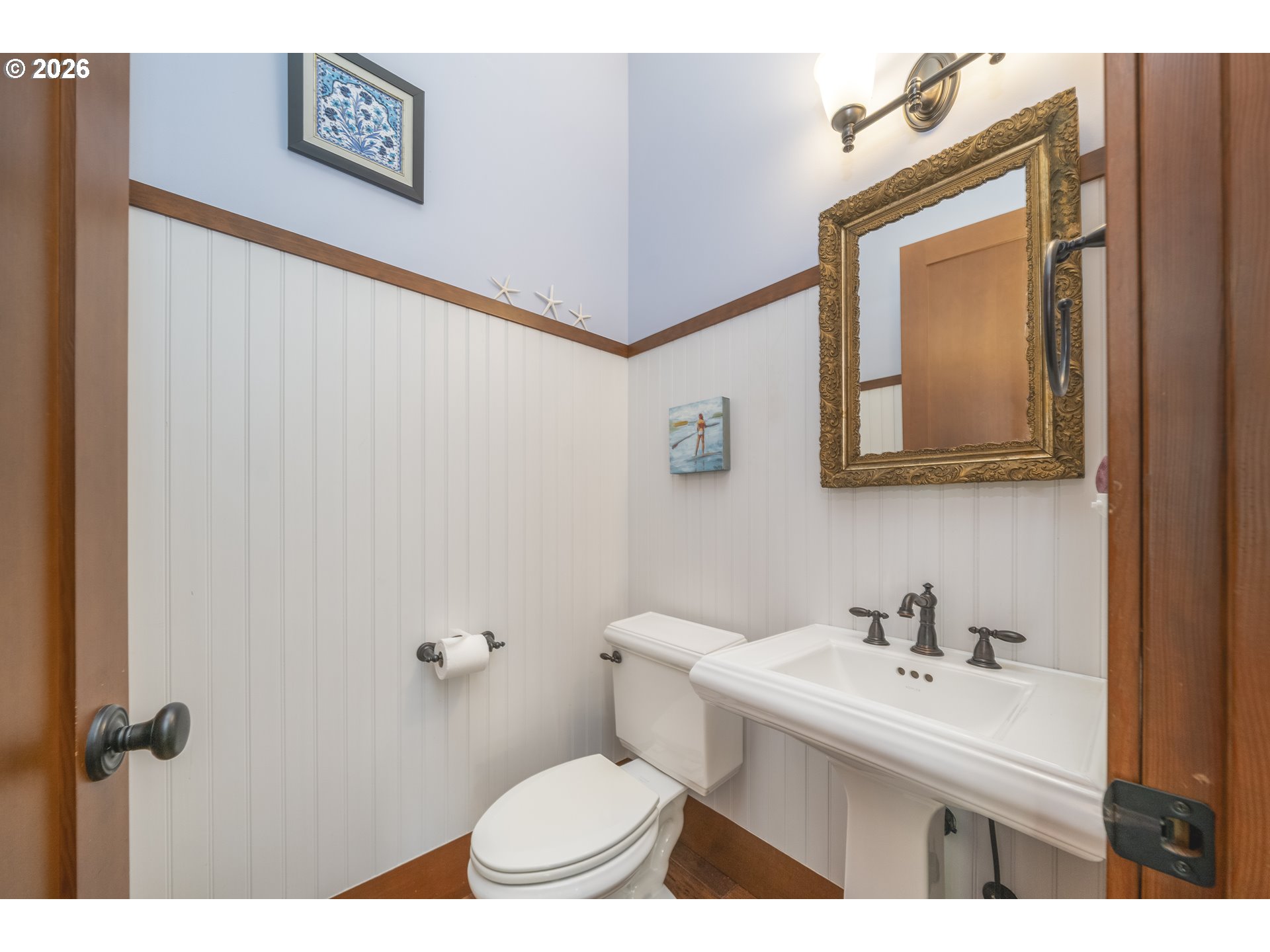 7850 Brooten Mountain Road Pacific City, OR 97135 - Photo 12 of 48 a bathroom with a sink mirror and toilet