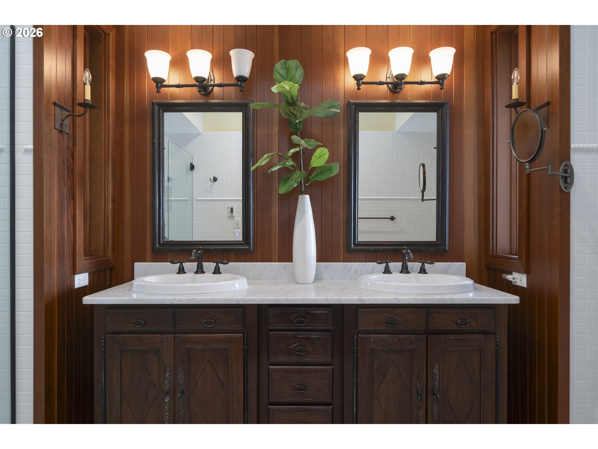 7850 Brooten Mountain Road Pacific City, OR 97135 - Photo 18 of 48 a bathroom with a double vanity sink and a mirror