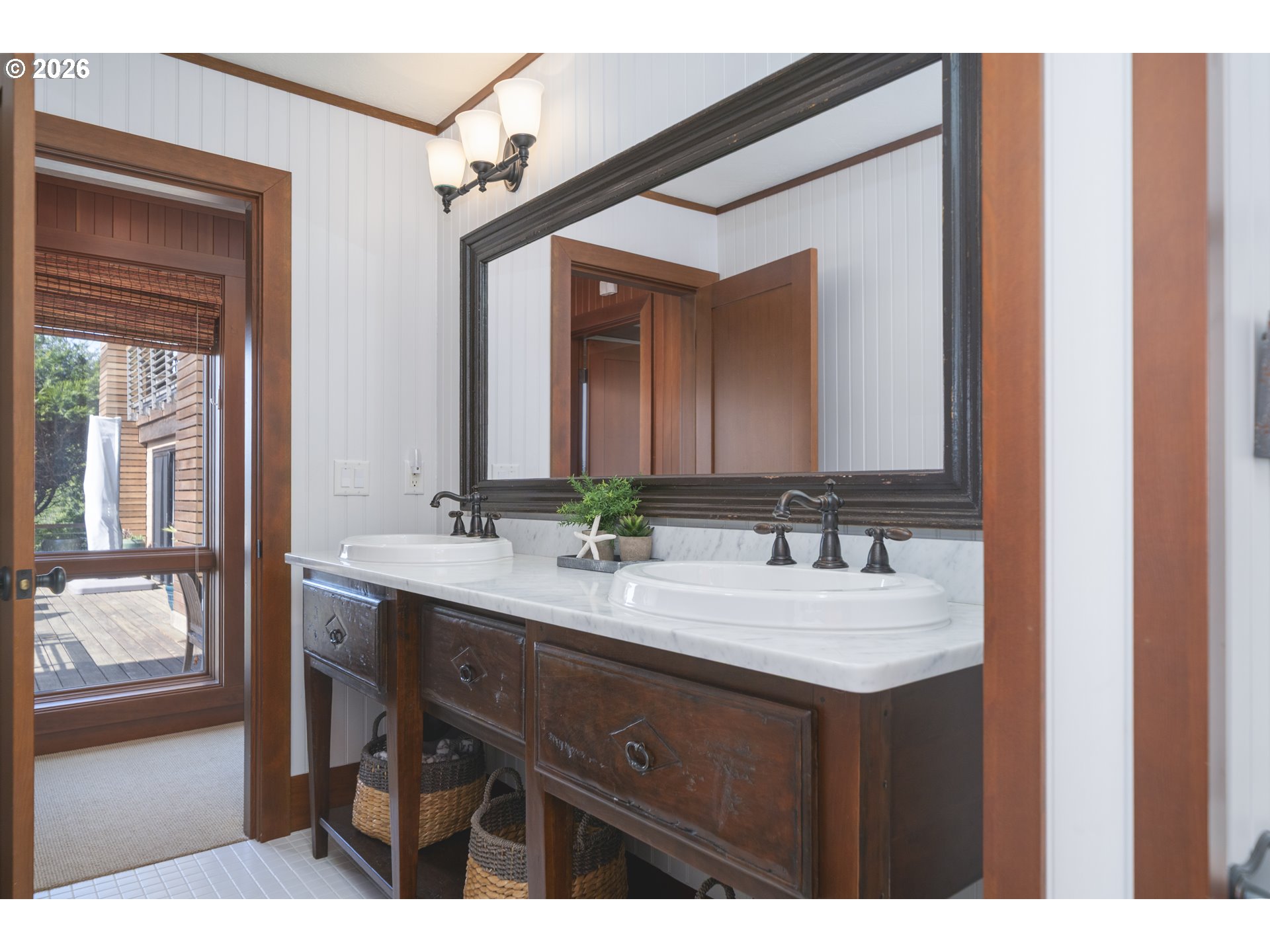 7850 Brooten Mountain Road Pacific City, OR 97135 - Photo 35 of 48 a bathroom with a sink and a mirror