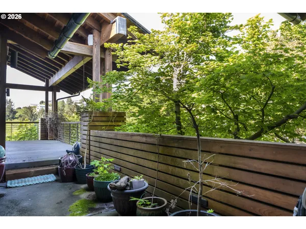 a utility room with cabinets washer and dryer
