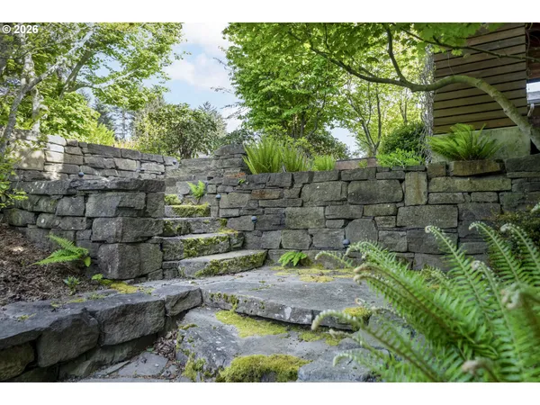 a view of a city with mountains in the background