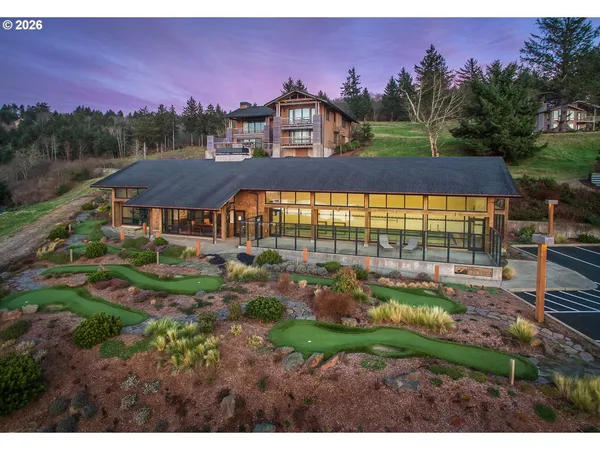 a living room with furniture fireplace and a flat screen tv