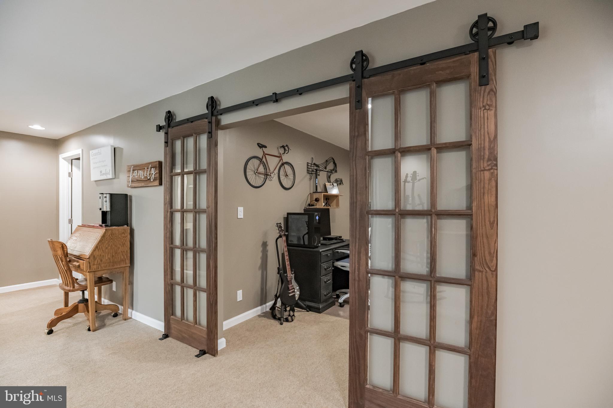 920 Carson Road Huntingtown, MD 20639 - Photo 21 of 32 a view of a hallway with furniture