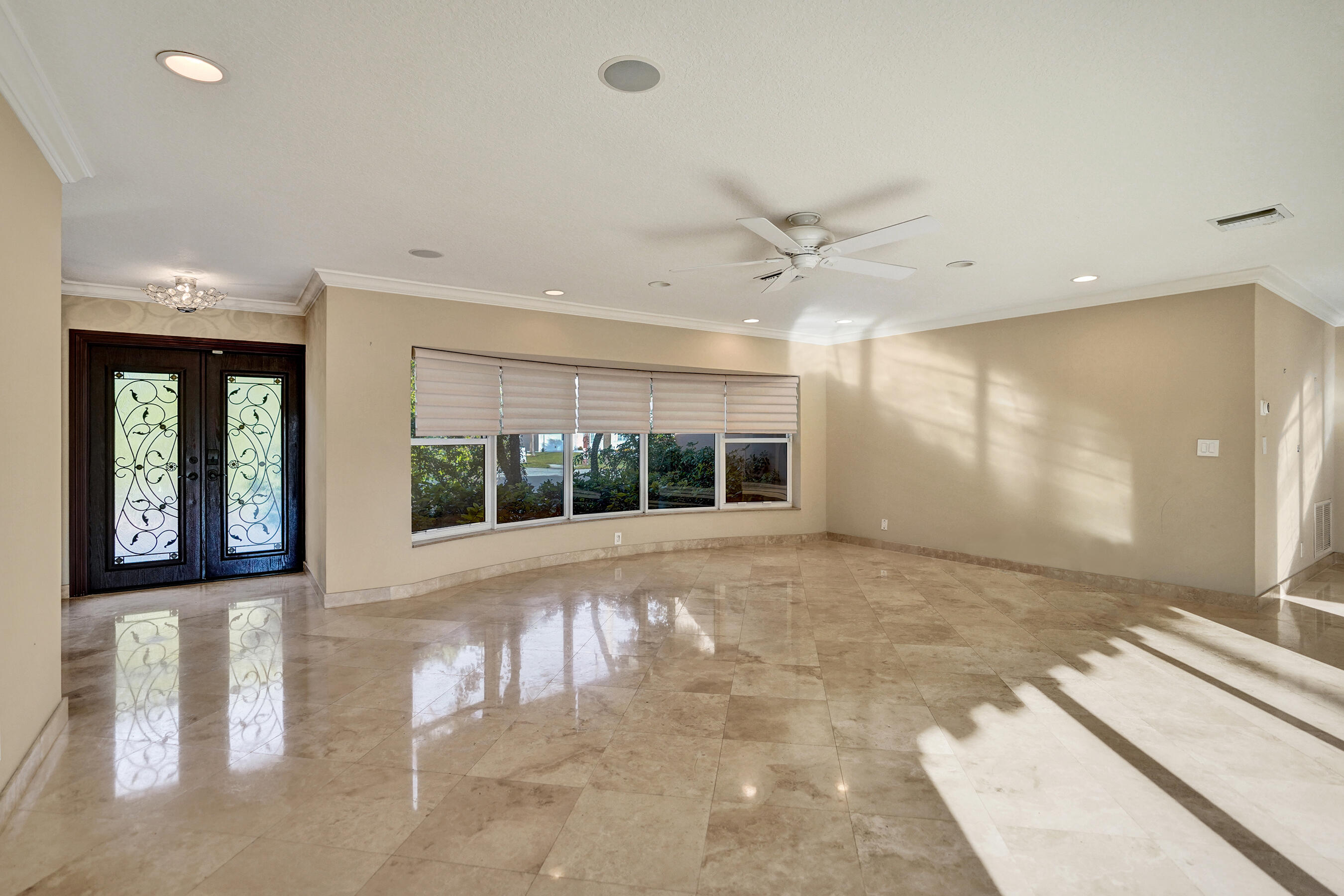 7050 Northeast 7th Avenue Boca Raton, FL 33487 - Photo 9 of 25 a view of an empty room with a window