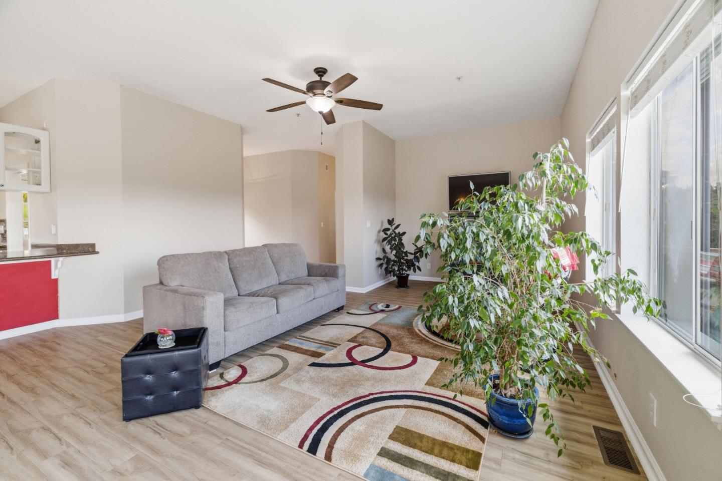 19269 Mallory Canyon Road, Unit D Salinas, CA 93907 - Photo 4 of 77 a living room with furniture and a potted plant