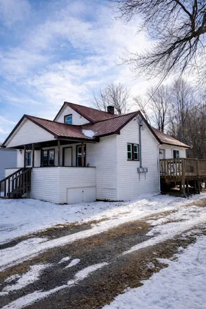 a view of a house with a patio
