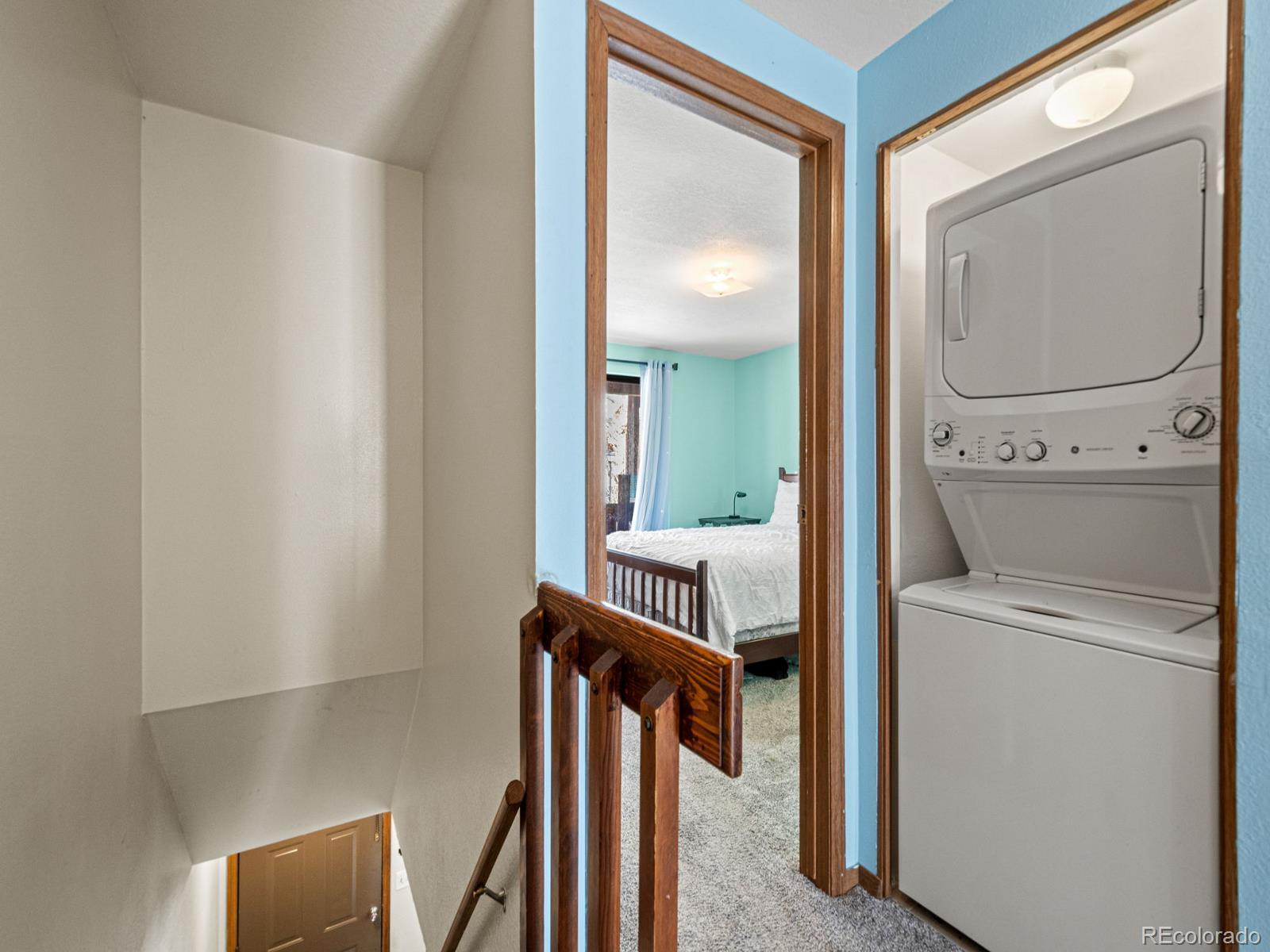 3301 Riverside Drive Idaho Springs, CO 80452 - Photo 13 of 35 a view of a hallway with washer and dryer