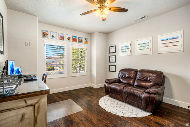 2311 South 1340 West St. George, UT 84770 - Photo 23 of 56 Office space featuring dark wood-style flooring, ceiling fan, and a textured ceiling