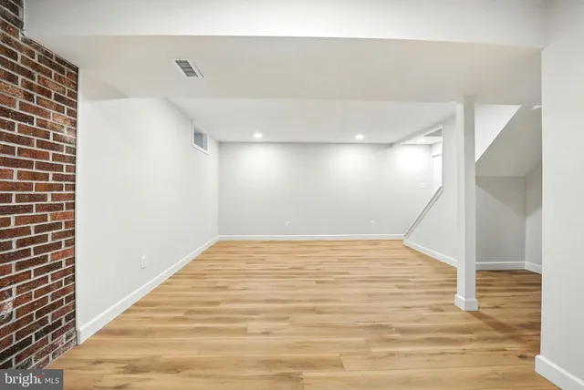 a view of outdoor space with deck and tree