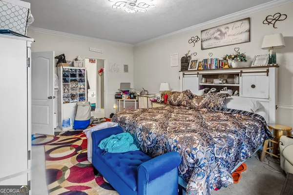 a view of a bedroom and bedroom