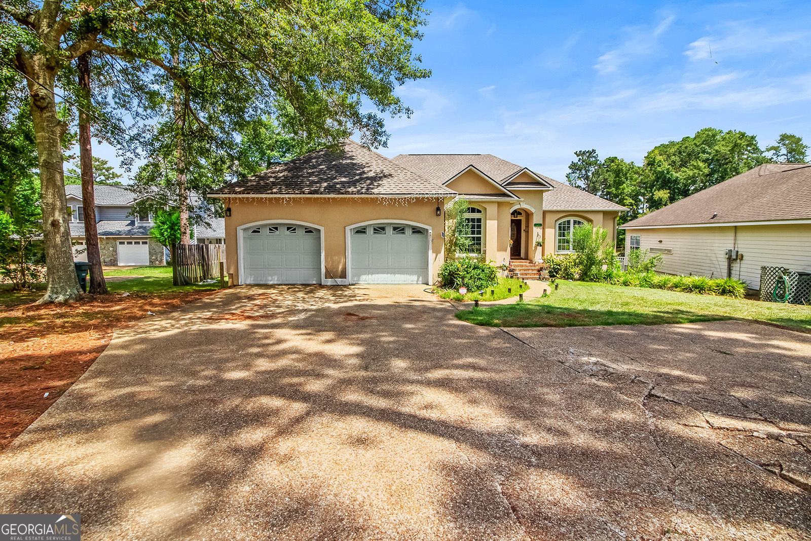 120 Timber Ridge Drive Thomasville, GA 31757 - Photo 2 of 23 a front view of a house with a yard and potted plants