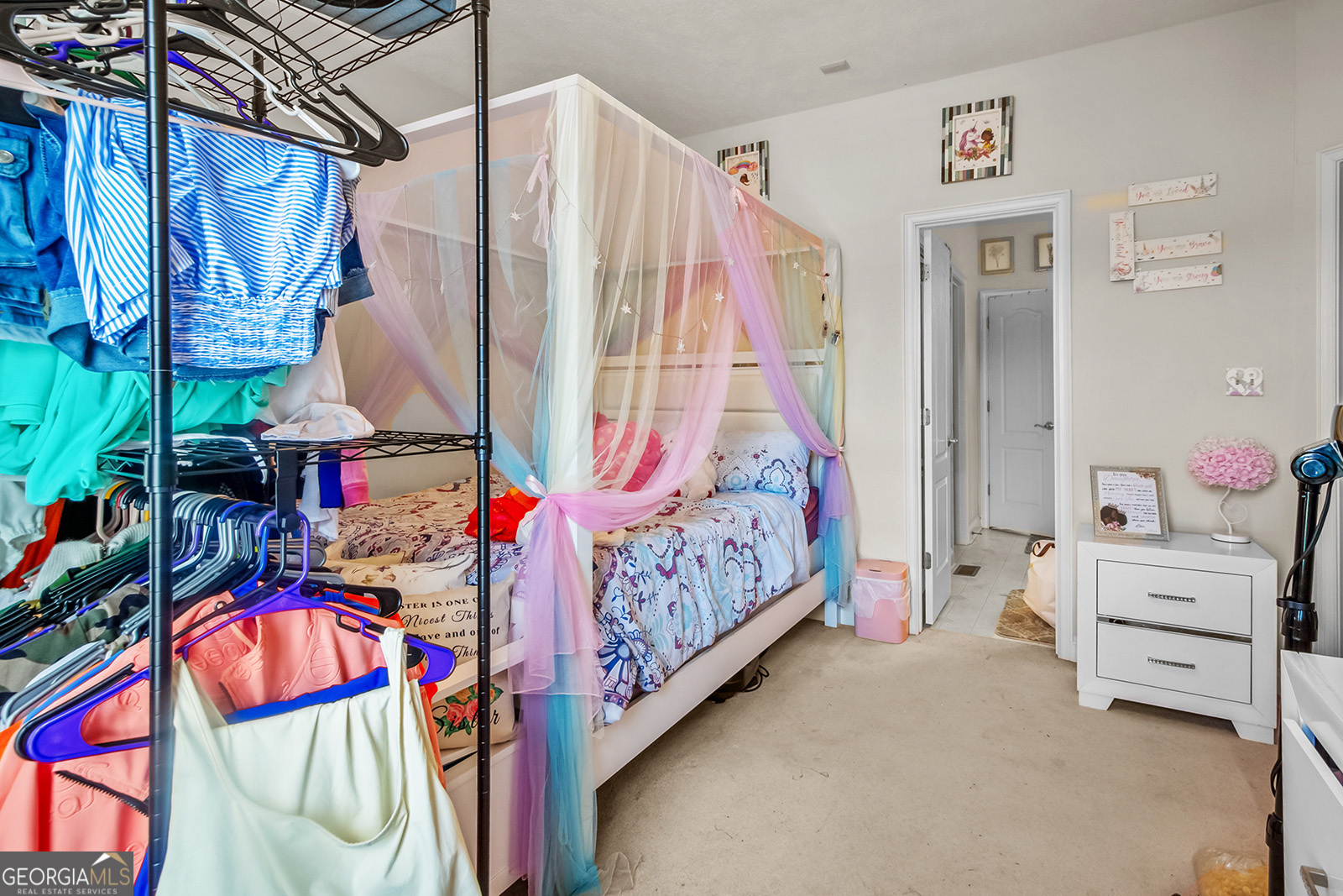 120 Timber Ridge Drive Thomasville, GA 31757 - Photo 21 of 23 a view of walk in closet with clothes and shoes