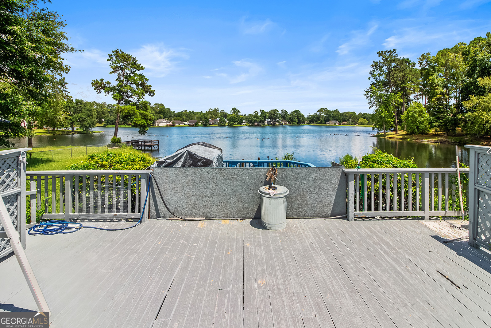 120 Timber Ridge Drive Thomasville, GA 31757 - Photo 22 of 23 a view of a deck with two chairs and a table