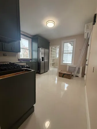 a room with furniture and a window