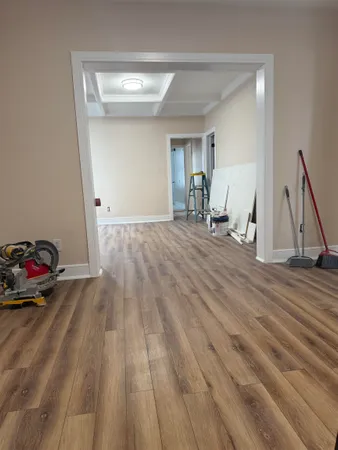 a view of a livingroom with wooden floor