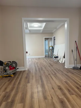 a view of livingroom with furniture and wooden floor