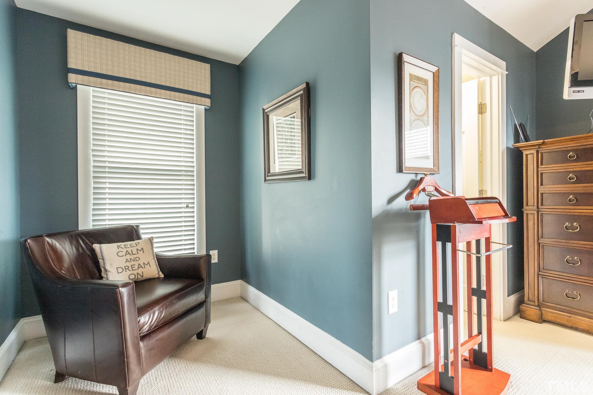 613 West Cabarrus Street, Unit 202 Raleigh, NC 27603 - Photo 18 of 25 a living room with furniture and a window