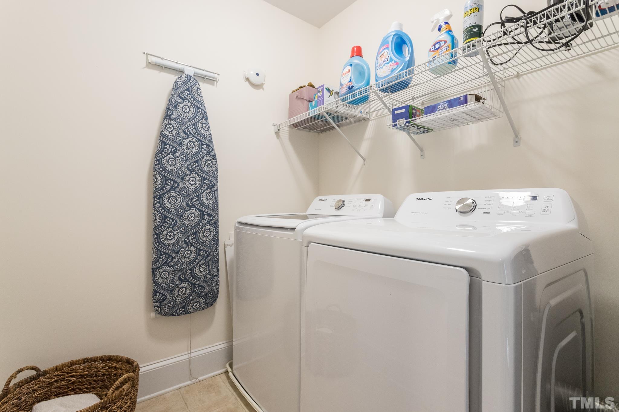 613 West Cabarrus Street, Unit 202 Raleigh, NC 27603 - Photo 20 of 25 a utility room with dryer and washer