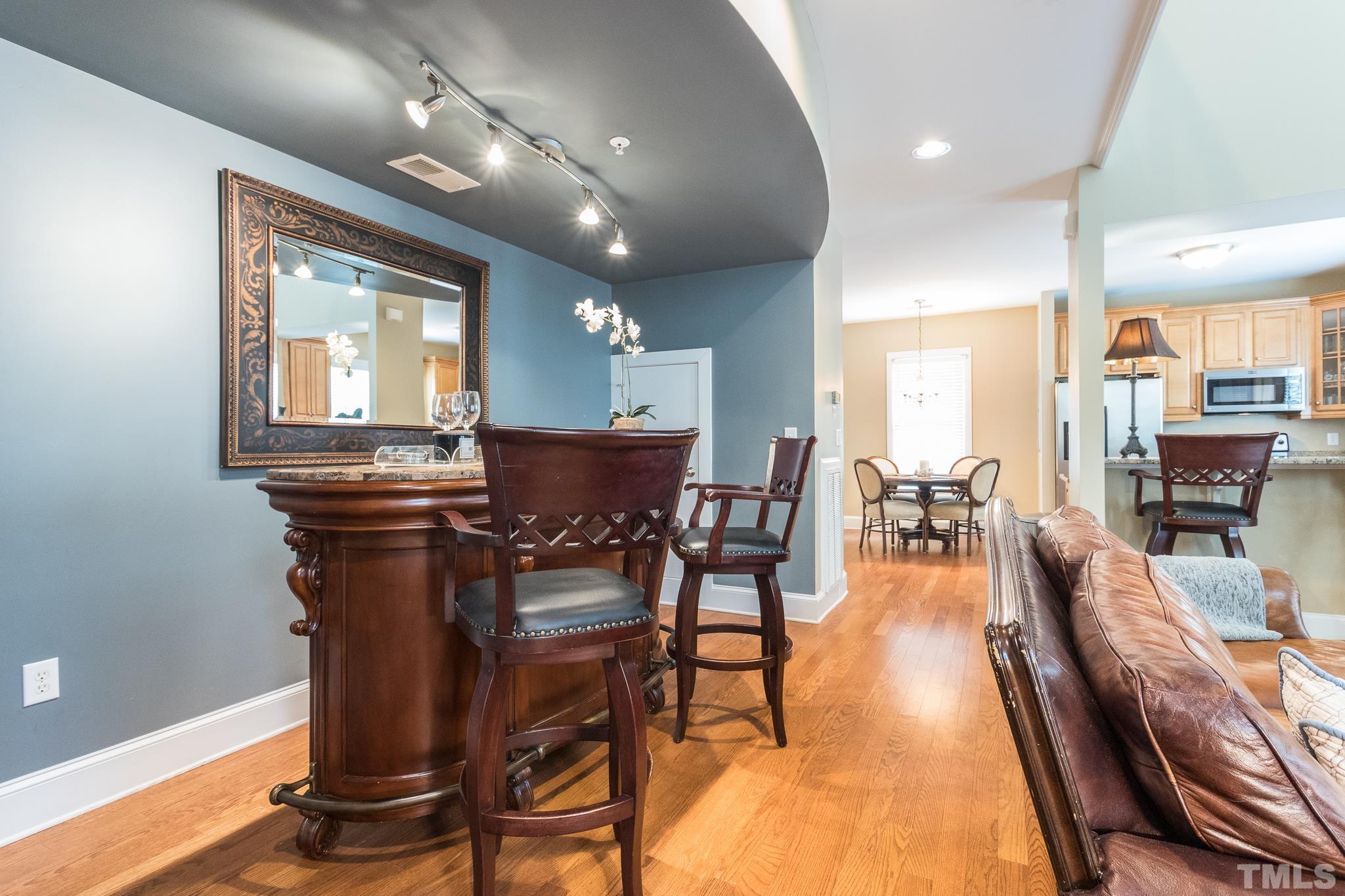 613 West Cabarrus Street, Unit 202 Raleigh, NC 27603 - Photo 9 of 25 a view of a dining room with furniture