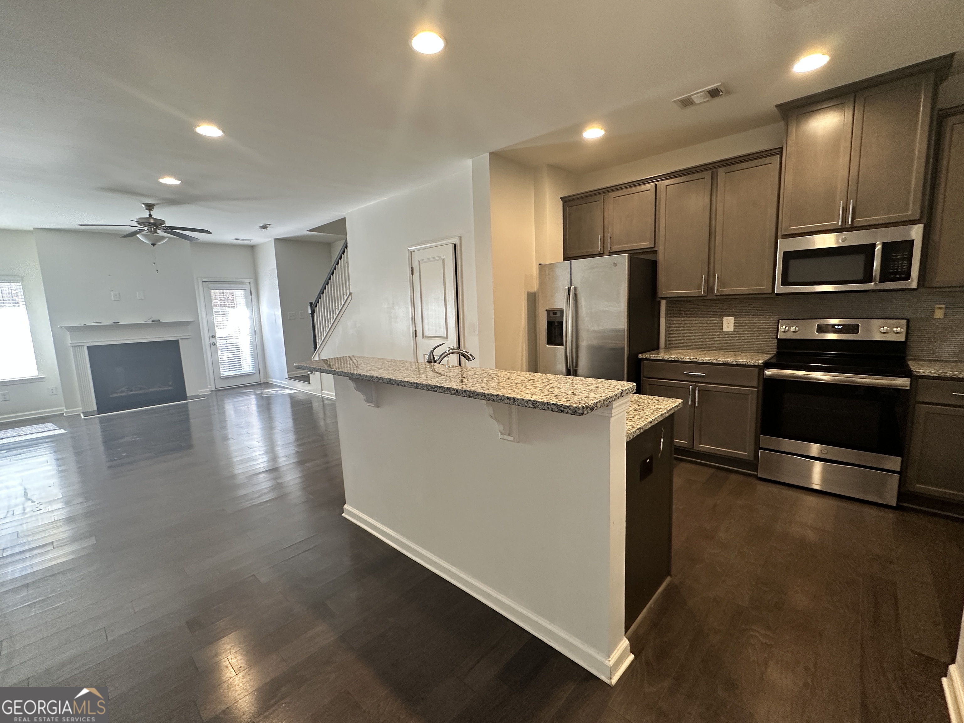 882 Ambient Way Atlanta, GA 30331 - Photo 2 of 61 a kitchen with stainless steel appliances granite countertop a refrigerator a sink a stove and cabinets