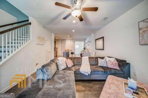 882 Ambient Way Atlanta, GA 30331 - Photo 24 of 61 a living room with furniture and a ceiling fan