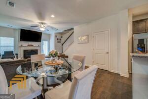 882 Ambient Way Atlanta, GA 30331 - Photo 27 of 61 a view of a livingroom with furniture and a flat screen tv