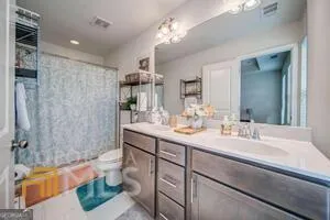 a view of storage and utility room with washer and dryer