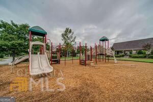 882 Ambient Way Atlanta, GA 30331 - Photo 45 of 61 a view of a park with swings