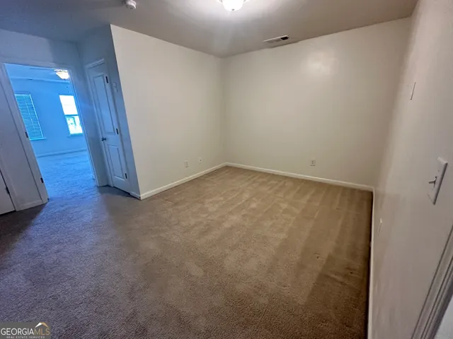 a bathroom with a tub sink vanity and shower